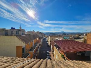 a view of a city street with buildings at Corralazo A in Calasparra