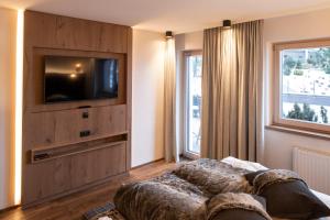 Voodi või voodid majutusasutuse Superior Hotel Post Ischgl toas