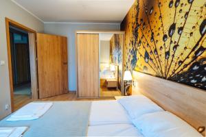 Posteľ alebo postele v izbe v ubytovaní Apartament 19 Szklarska Poręba + 35 fotografií