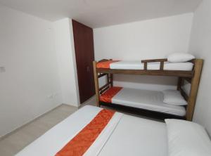 Cabaña Gaia Rodadero客房内的一张或多张床位