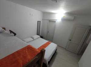 Cabaña Gaia Rodadero客房内的一张或多张床位