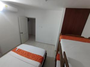Cabaña Gaia Rodadero客房内的一张或多张床位