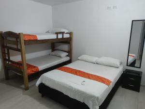 Cabaña Gaia Rodadero客房内的一张或多张床位