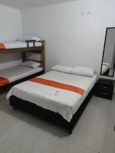 Cabaña Gaia Rodadero客房内的一张或多张床位