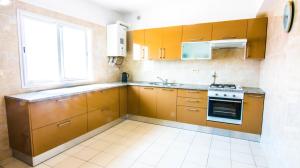 Kuchyň nebo kuchyňský kout v ubytování Mahdia Place Apartments