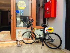 a bike parked in front of a store at ENA Serenity Boutique Hotel Ephesus in Selçuk