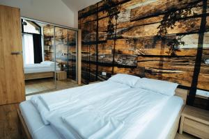 Ένα ή περισσότερα κρεβάτια σε δωμάτιο στο Apartament 114 Szklarska Poręba