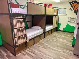 a bunk bed room with two bunk beds at RAD Hostel in Colorado Springs