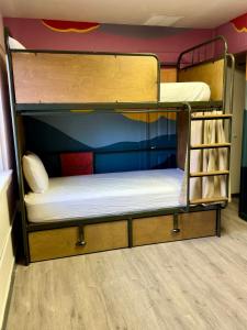 a bunk bed with two bunk beds in a room at RAD Hostel in Colorado Springs