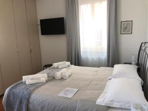 Кровать или кровати в номере Casa mia a Nervi