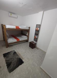 Cabaña Gaia Rodadero客房内的一张或多张床位