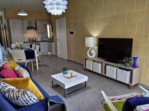 TV i/ili multimedijalni sistem u objektu Apartment close to the sea