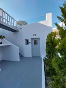 Balkón nebo terasa v ubytování East Wind Perissa + 37 fotografií