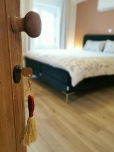 Postel nebo postele na pokoji v ubytování B&B Lili's Tuin