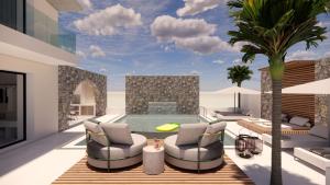uma villa com uma piscina com 2 cadeiras e uma mesa em Kallithea Luxury Villas #3 em Koskinou
