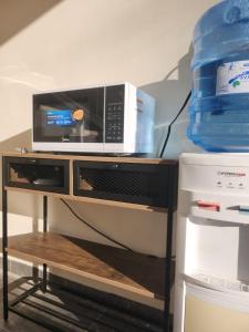 Kuchyň nebo kuchyňský kout v ubytování Hotel & Hostal 230