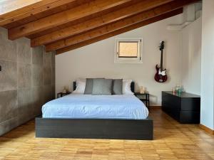 Posteľ alebo postele v izbe v ubytovaní Magic Place Bergamo! Relax Apartment with terrace in the heart of the city