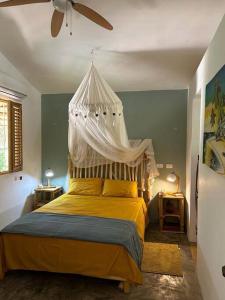Postel nebo postele na pokoji v ubytování Casa Cayena