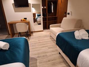 Postel nebo postele na pokoji v ubytování 3M Hostel & Suites