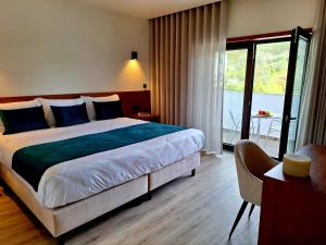 Postel nebo postele na pokoji v ubytování 3M Hostel & Suites