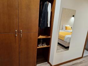 Postel nebo postele na pokoji v ubytování 3M Hostel & Suites