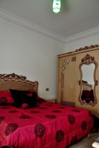 เตียงในห้องที่ Villa Amine Zamm