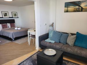 Postel nebo postele na pokoji v ubytování Blue Star Apartments