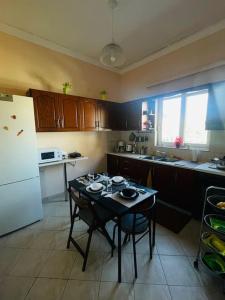 Kuchyň nebo kuchyňský kout v ubytování Bayside Apt. + 19 fotografií
