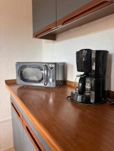 אביזרים להכנת קפה ותה ב-Pension FAULPELZ - Apartment