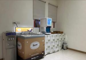 Cucina o angolo cottura di Hua Xiang Motel - Arena