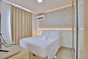 En eller flere senge i et værelse på Belíssimo Flat no Lake Side - Beira Lago + 45 billeder