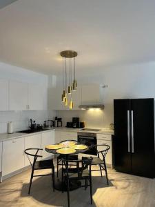 Η κουζίνα ή μικρή κουζίνα στο Deluxe Apartment Bochum 1 BEDROOM