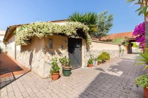 Zahrada ubytování Casa “Oasi del mare”