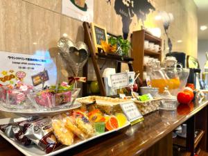 a buffet of food on a counter in a store at La Jolie Motomachi in Hakodate