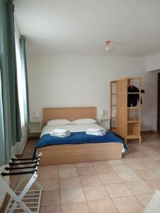 En eller flere senge i et værelse på Casa di Corte a Milano