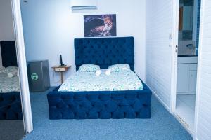 Ein Bett oder Betten in einem Zimmer der Unterkunft JDREAMLOC