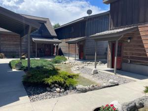 a building with a garden in front of it at Sweet Pea in Red Lodge