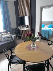 Posteľ alebo postele v izbe v ubytovaní Apartament Walczaka nr 45-MIEJSCE PARKINGOWE + 17 fotografií