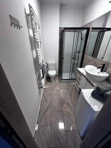 Kúpeľňa v ubytovaní Apartament Walczaka nr 45-MIEJSCE PARKINGOWE