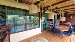 Et tv og/eller underholdning på Apartamento terreo no reserva dos Carneiros