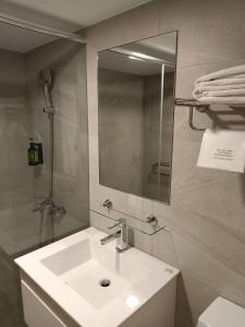 Koupelna v ubytování Mu Chen Hotel