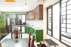 Kuchyň nebo kuchyňský kout v ubytování ART GREEN HOME + 16 fotografií