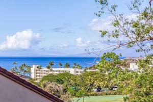 a view of a resort with the ocean in the background at Kaanapali Royal Q302-Oceanview spacious 2 bedroom Kaanapali Royal gem in Lahaina