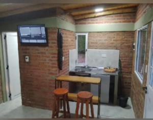 Köök või kööginurk majutusasutuses Ushua Aike (Nuestro Lugar)