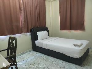 Postel nebo postele na pokoji v ubytování DD Homestay