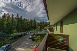 Budova, kde se apartmán nachází + 5 fotografií
