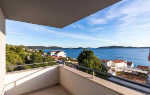 a balcony with a view of the water at Beautiful Home In Sevid Na Moru in Sevid +32 photos