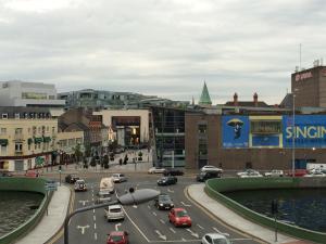 a busy city street with cars on the road at 39 Camden Wharf in Cork