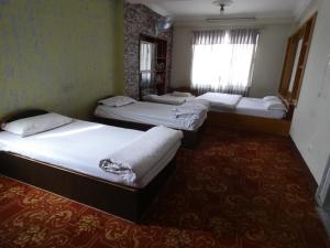 Voodi või voodid majutusasutuse Sara's Backpackers Hotel toas
