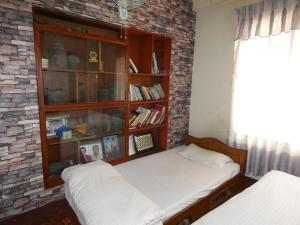 Voodi või voodid majutusasutuse Sara's Backpackers Hotel toas